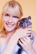 woman with chinchilla